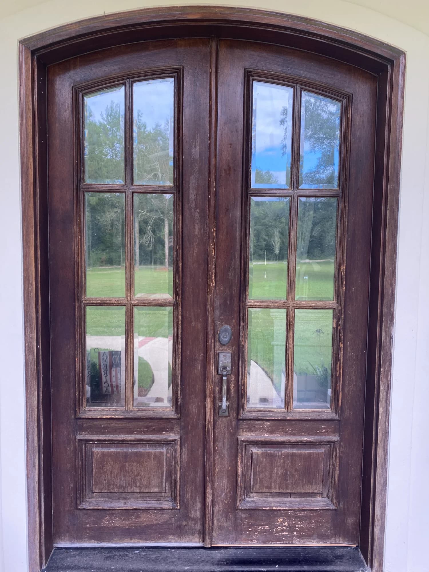 Before: Mandeville Mahogany Door Restoration